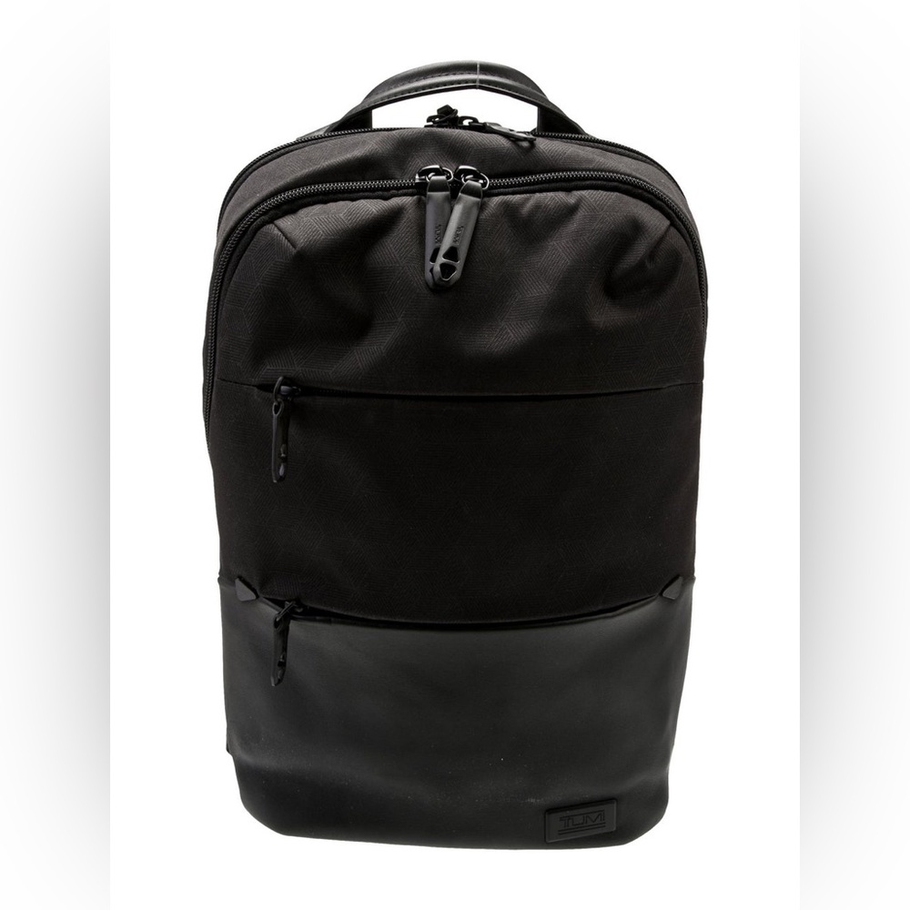 Like new Tumi Tahoe Elwood nylon backpack with leather accent